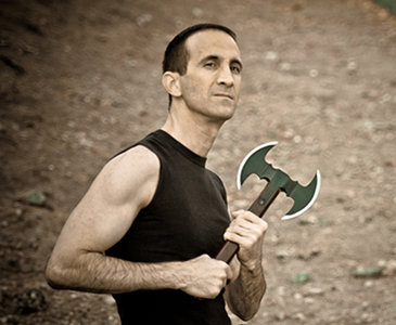 Gregory weilding an axe